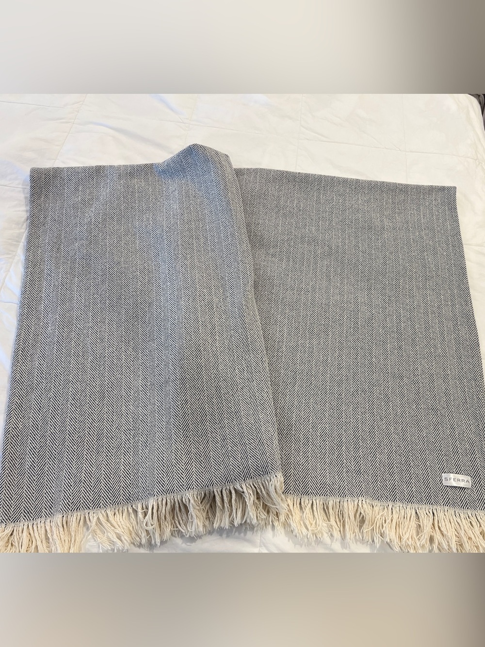 Sferra navy and cream herringbone throw